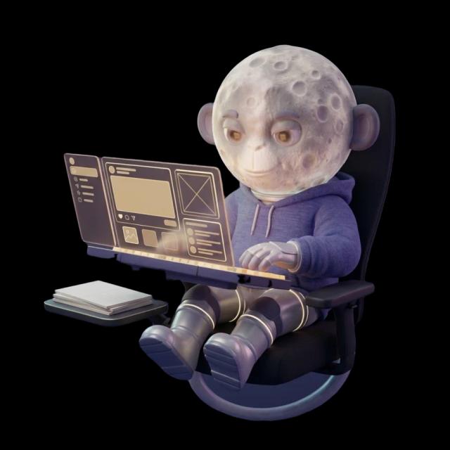 Moonkey writing a post at a laptop